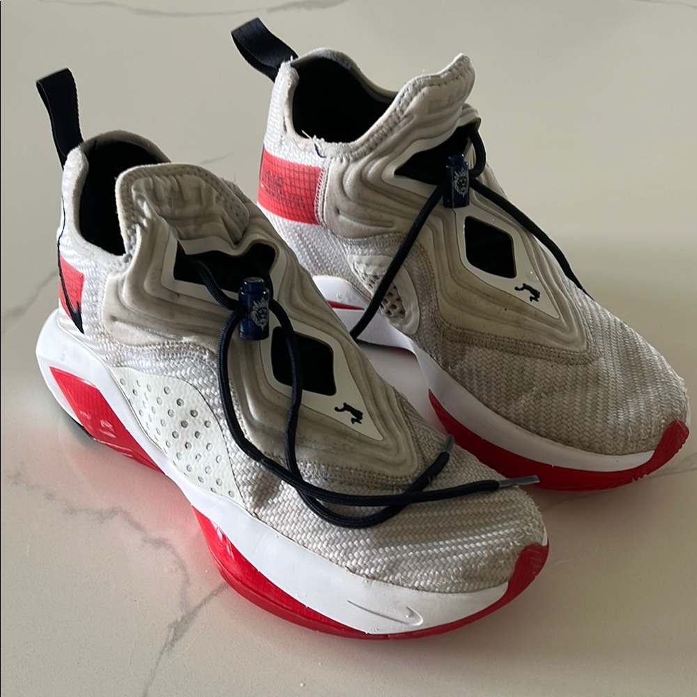 Nike Red and White Athletic Shoes Modern Design